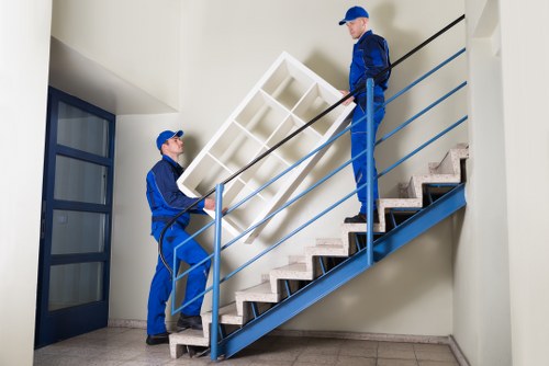 Local movers handling stair access in a Putney flat