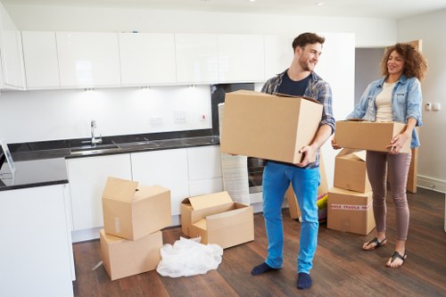 Packed office furniture and boxes ready for a business move