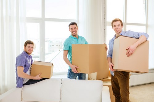 Putney moving truck loading furniture with care